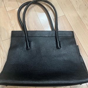 Cleo & Patek leather hand bag.